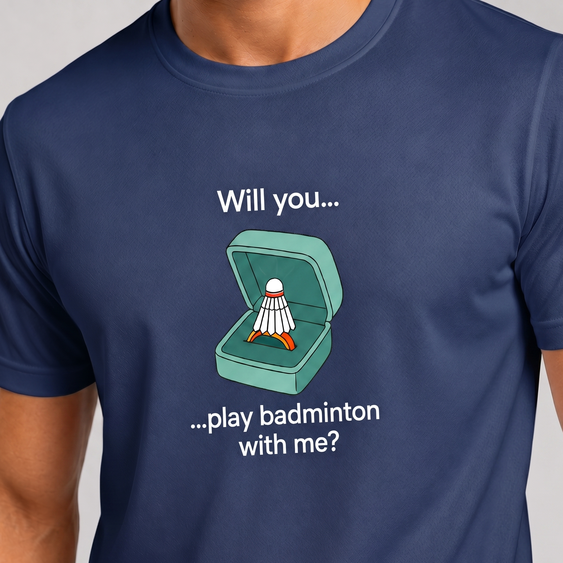 Navy blue t-shirt with a badminton-themed graphic and text on a plain background