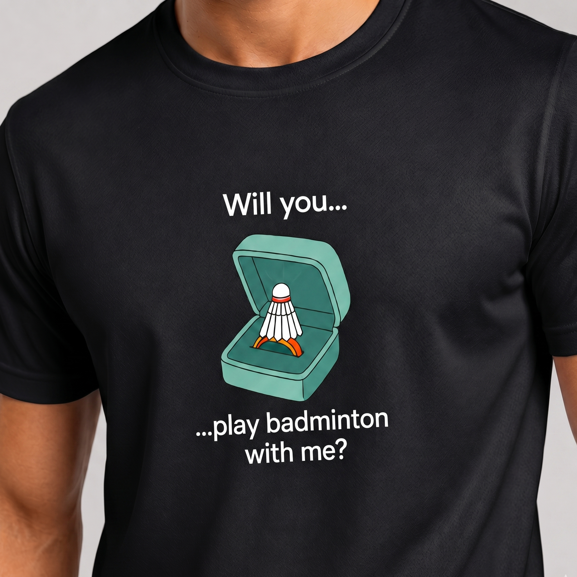 Black t-shirt with a badminton-themed design and text on a plain background