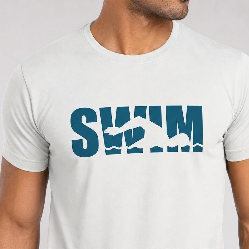 White t-shirt with blue 'SWIM' graphic on a plain background