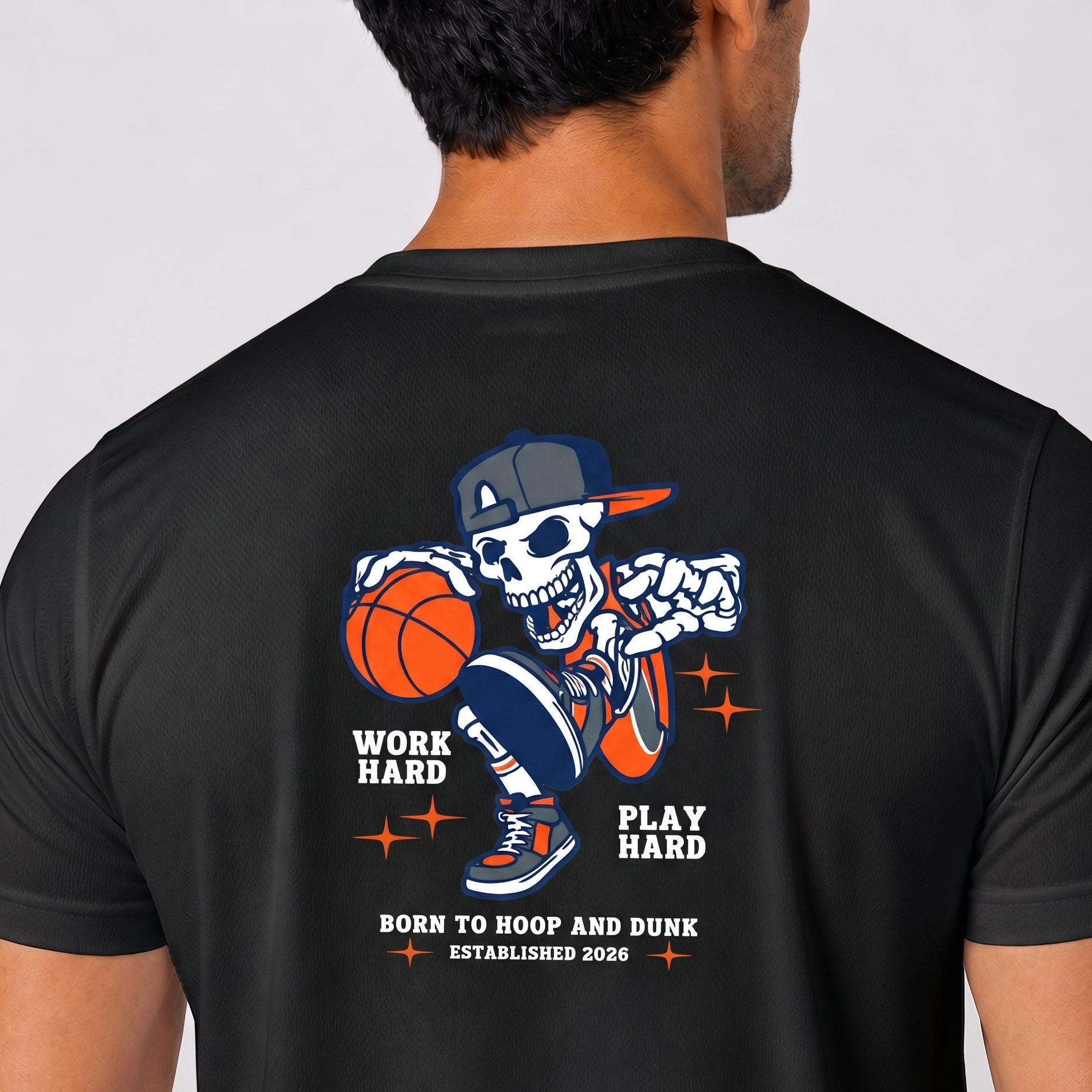 Black t-shirt with a skeleton playing basketball graphic and text on the back