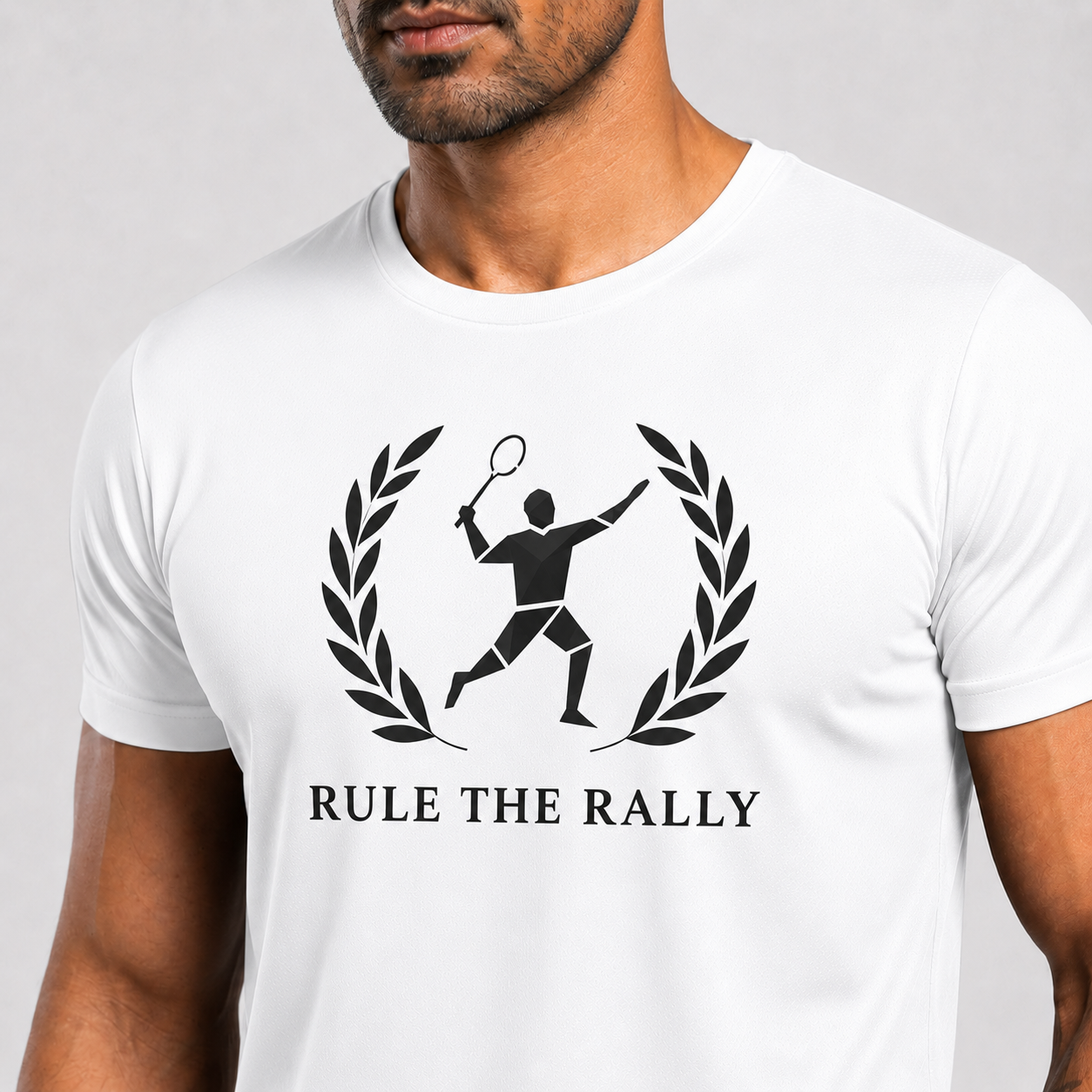 White t-shirt with 'Rule the Rally' graphic design on a gray background