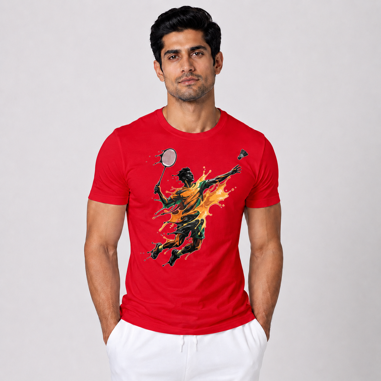 Man wearing a red t-shirt with a graphic design on a plain background
