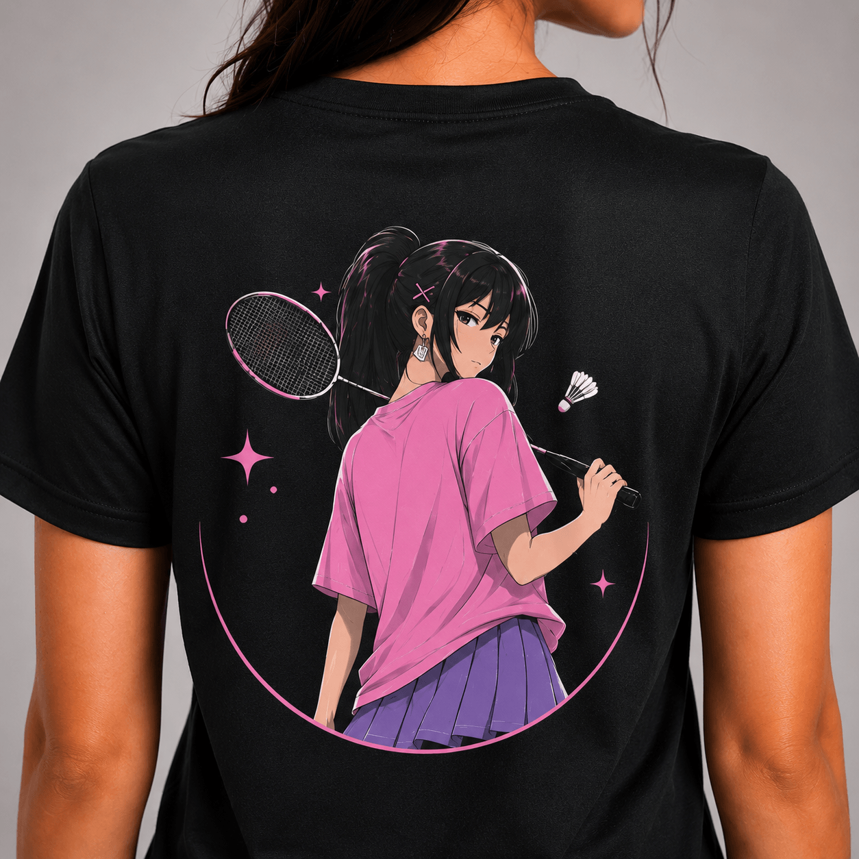 Badminton t-shirt with an anime-style graphic of a girl holding a badminton racket on a gray background