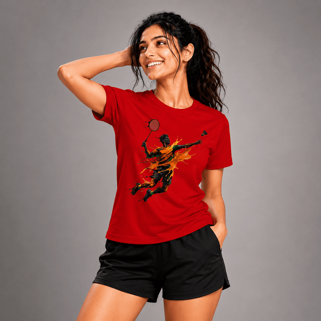 Woman wearing a red t-shirt with a graphic design on a gray background