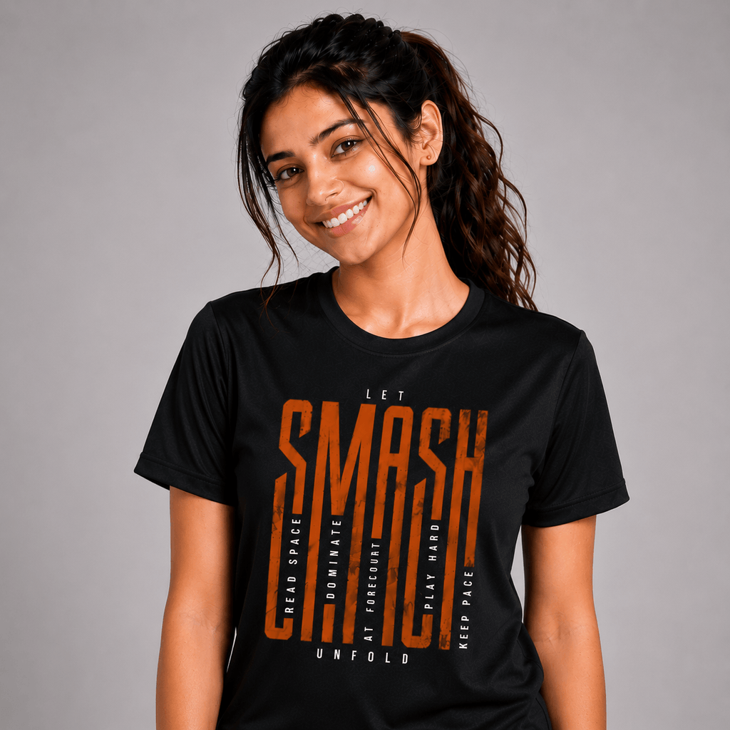 Woman wearing a black badminton t-shirt with orange text on a gray background