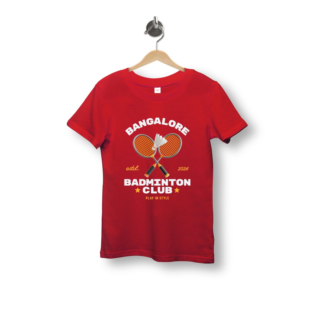 Red t-shirt with badminton club design on a hanger against a white background