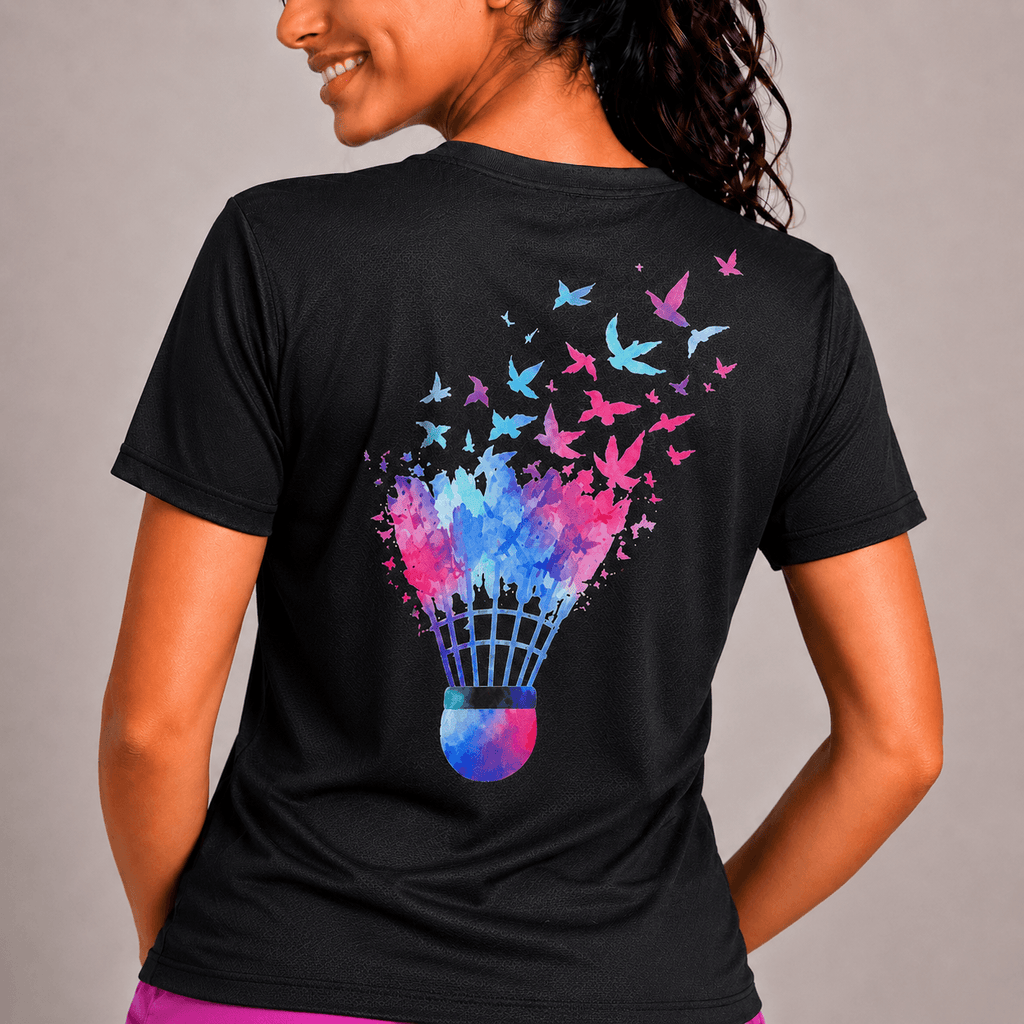 Person wearing a black t-shirt with a colorful badminton shuttlecock design on the back.